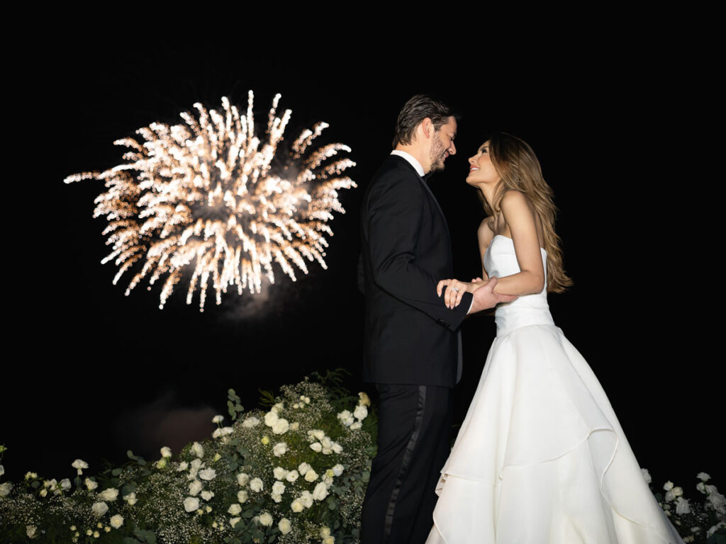 Bride And Groom In Front Of A Firework